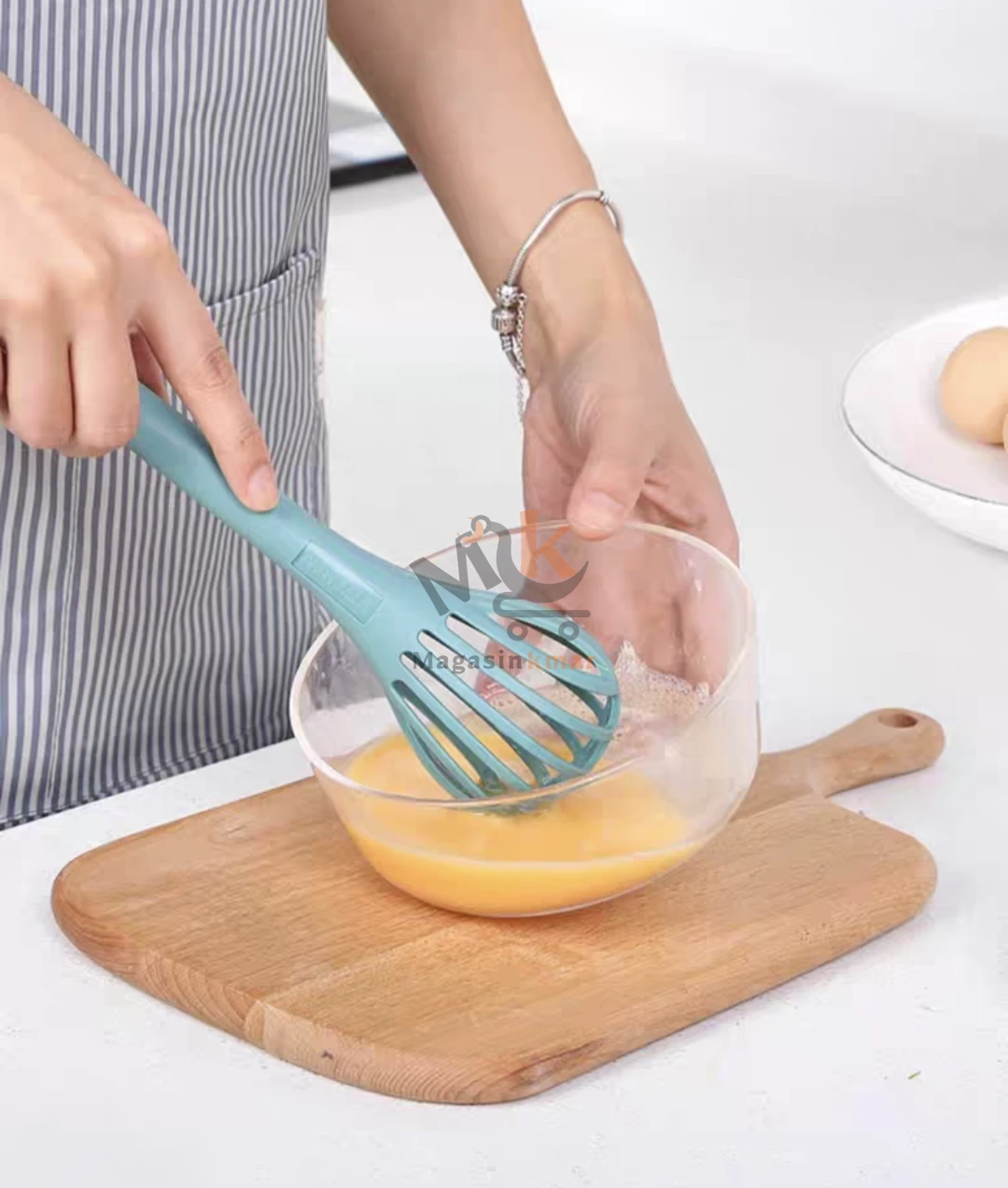 Pince /fouet en plastique alimentaire