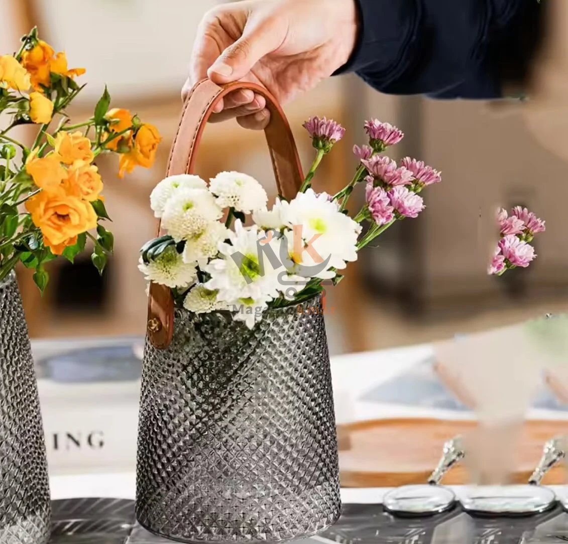 Vase en verre avec manche