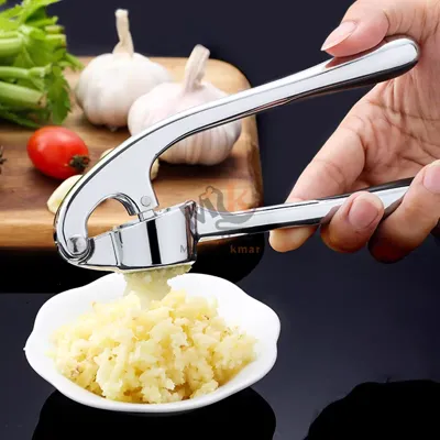 Presse-ail en acier avec poignées en plastique – Compact et efficace